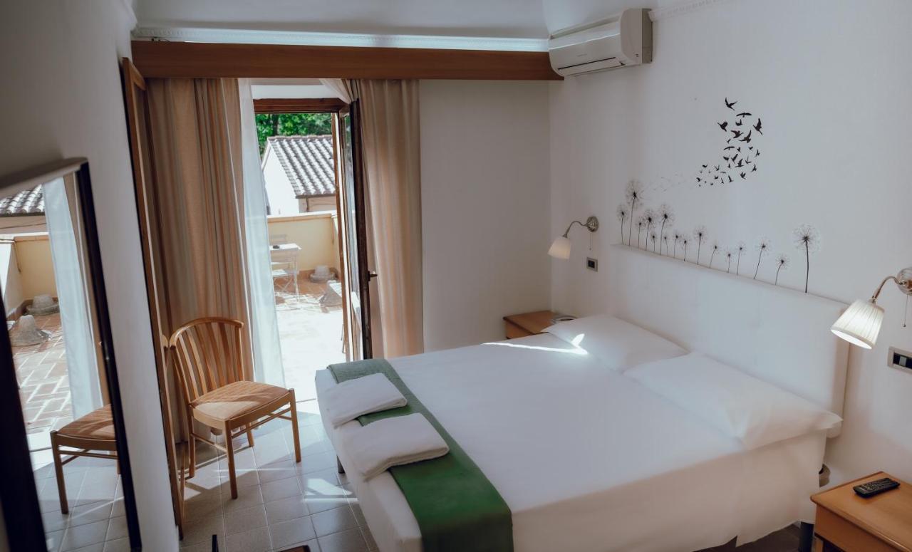 Hotel Francesco Pisa Bagian luar foto